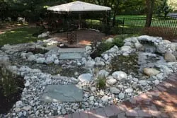 Pond and waterfall on a Moorestown hillside